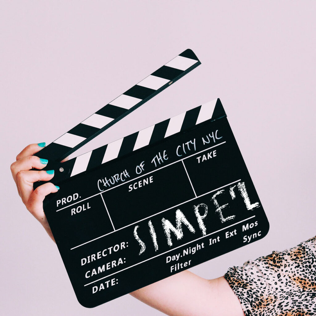 Filmklappe mit Aufschrift Simperl